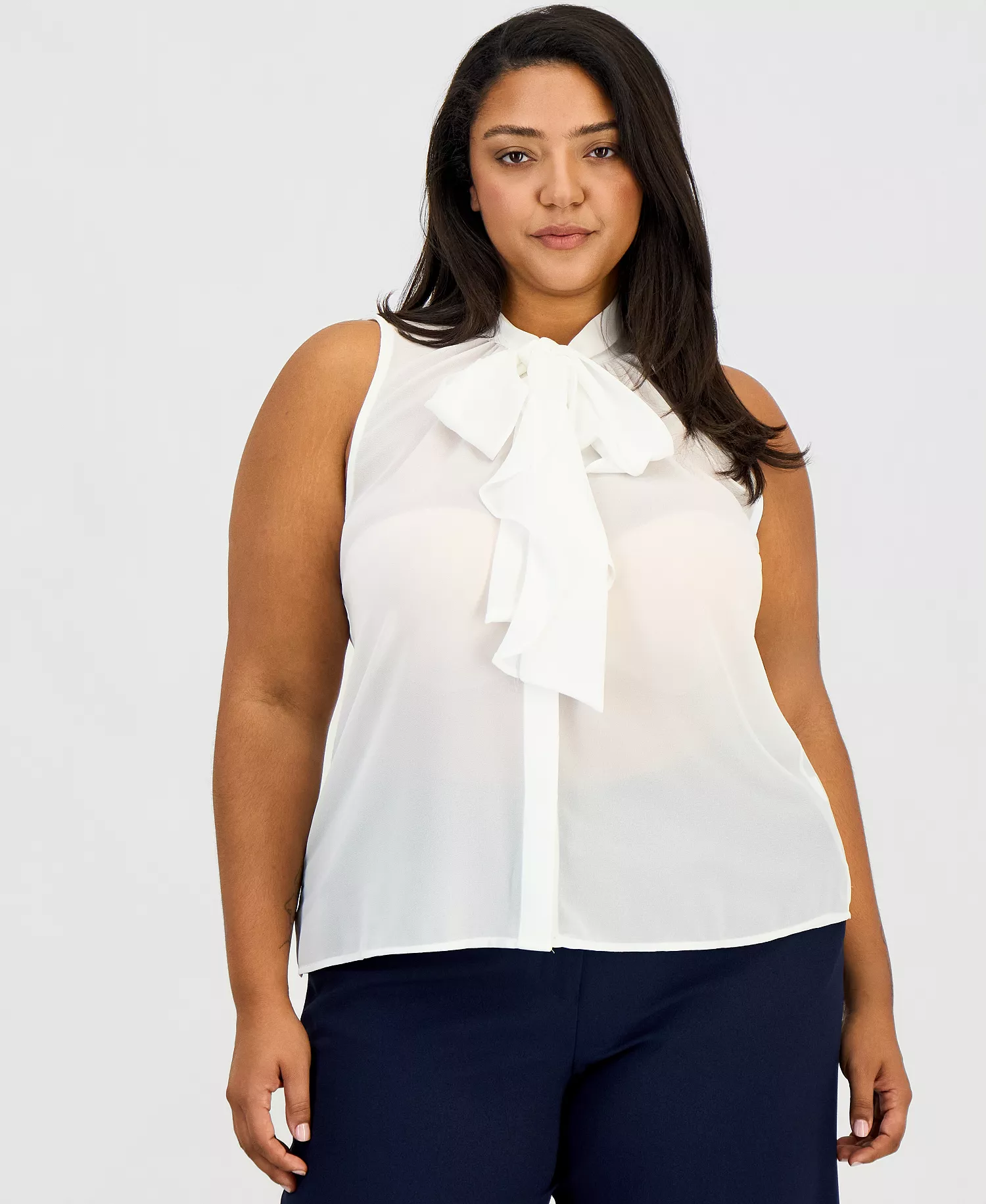 mni-be9d08c78e66d64c056ecde0eb6f6430 Plus Size Sleeveless Ruffled Bow Blouse