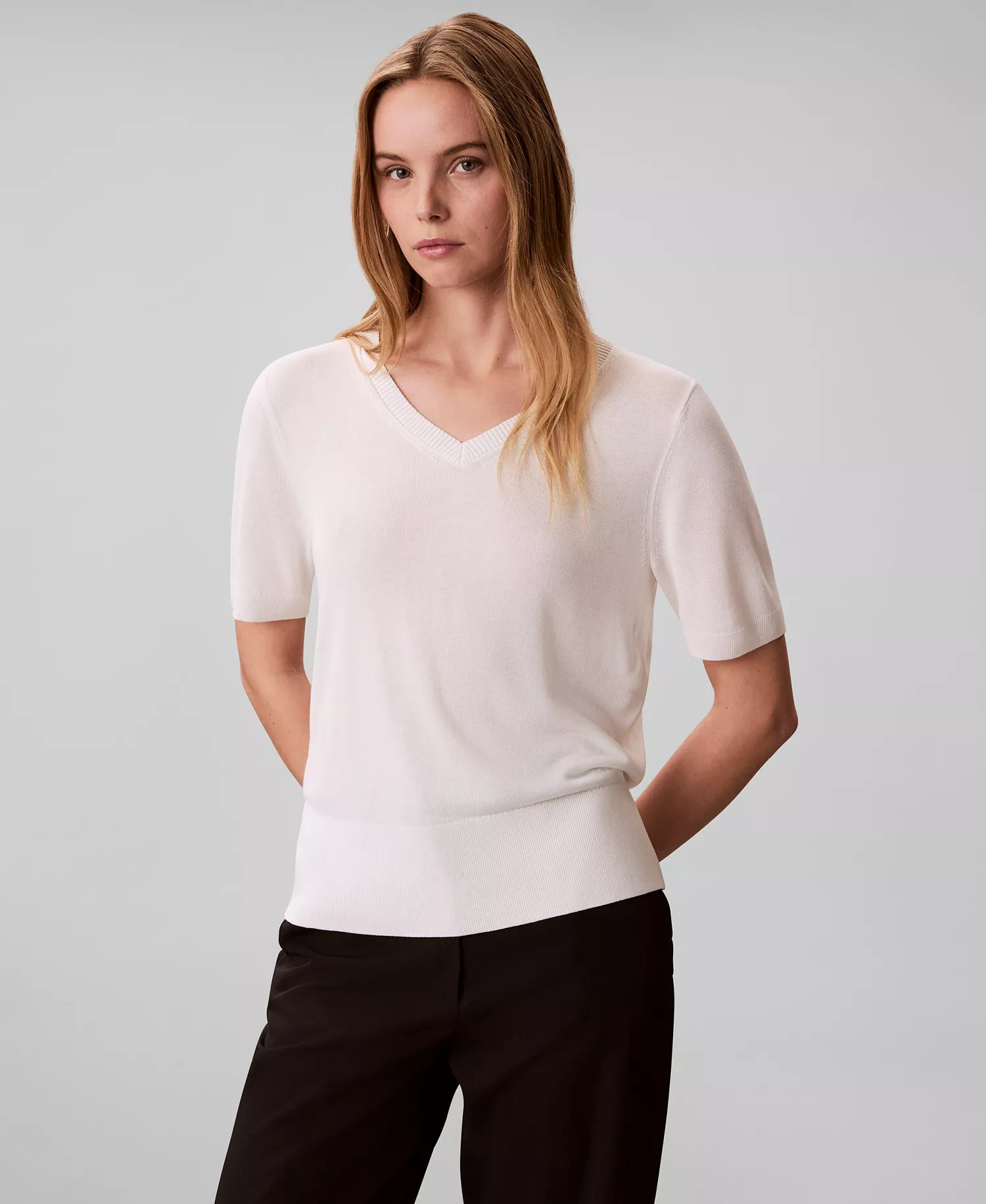 mni-ed946b4b0be48444f766a1139b72319e Women's V-Neck Knit Sweater